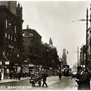Busy Market Street, Manchester, England