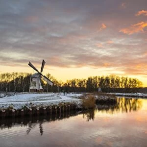 Witte Molen (White Mill) Dutch windmill in winter at sunset, Harn, Groningen, North Holland