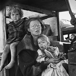 MOTHER AND CHILD, 1939. An impoverished family from Oklahoma arriving at a migrant