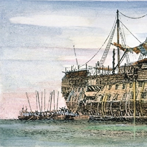 PRISON SHIP, ENGLAND. An English convict ship in which criminals were kept awaiting shipment to Australia: wood engraving, English, early 19th century