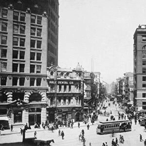 SAN FRANCISCO, c1900. Newspaper Row at Kearny and Market Streets, San Francisco; at far right stands the Hearst Building, second right the Chronicle Building. Photographed c1900