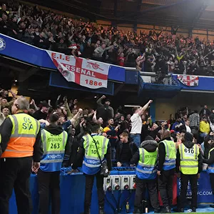 Arsenal Wins Premier League: Jubilant Fans Celebrate at Stamford Bridge