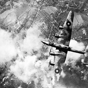 A Handley Page Halifax No 6 Group of RAF Bomber Command over the target during a daylight